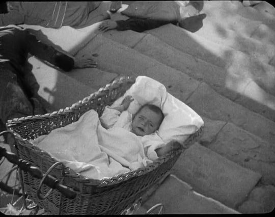 A baby in a carriage falling down the Odessa Steps, during the infamous Odessa Steps Massacre scene. By Sergei Eisenstein - Transferred from en.wikipedia to Commons., Public Domain, https://commons.wikimedia.org/w/index.php?curid=1493809