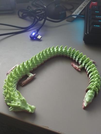 brown/green  ice dragon printed with rainbow PLA.