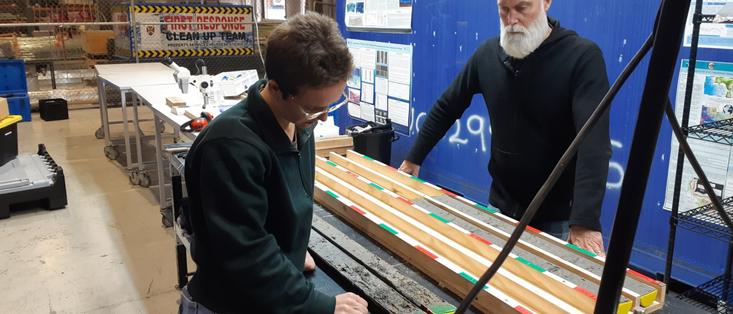 photo - inspecting sediment core