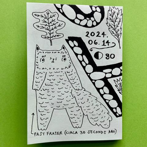 A cover of a printed zine/comic, featuring Fraser the cat looking a little surprised. There is an oak leaf above Fraser’s head.