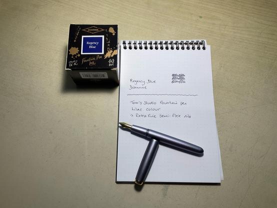 Ink swatch on an A5 Rhodia dotpad. Regency Blue ink from Diamine. The fountain pen is from Tom’s Studio.