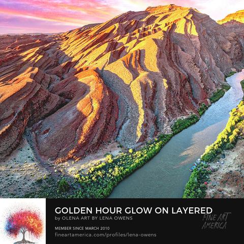Golden Hour Glow on Layered Rock Formations 
'Rocks rise to the sky, As day whispers its goodbye, In hues that satisfy. '
A winding river flows through a rugged canyon with layered rock formations under a warm sunset light.
Experience the breathtaking beauty of a Canyon River Landscape at sunset captured in this stunning photograph. Marvel at the Steep Rock Formations and Layered Geological Textures illuminated by the warm glow of dusk.