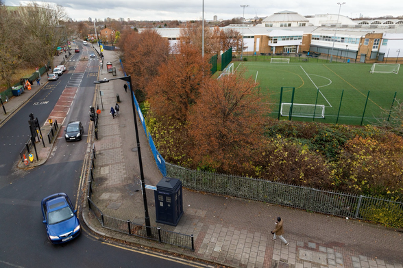 Composite of a police box at a road junction