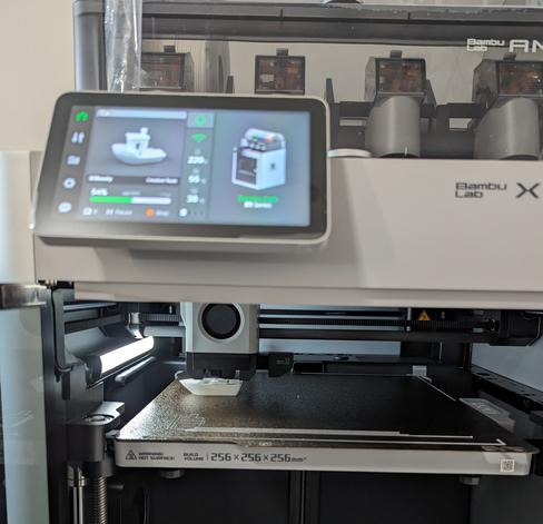 Zoom of my 3D printer showing the display and the print bed.