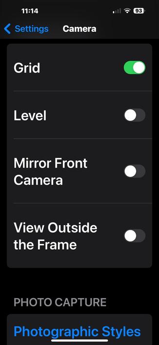 Camera settings screen with options for Grid, Level, Mirror Front Camera, and View Outside the Frame. Mirror Front Camera is toggled off