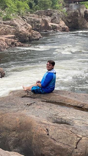 photo of me sitting on a waterfall
