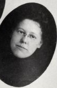 Winnifred Wygal, from a 1913 yearbook; a young white woman with dark hair, wearing pince-nez eyeglasses, in an oval frame