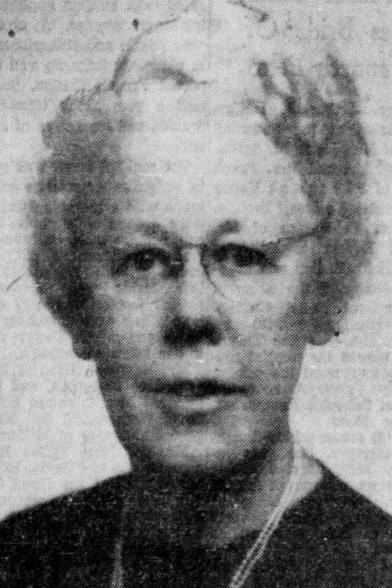 Winnifred Wygal, later in life, an older white woman with white hair cut short, weariing glasses