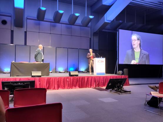 Steffen Neumann at the podium in Osaka receiving an honorary membership to the metabolomics society.