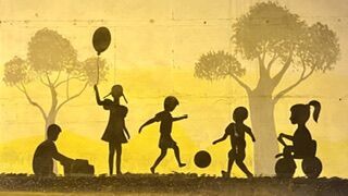 Graffiti of kids playing sports.