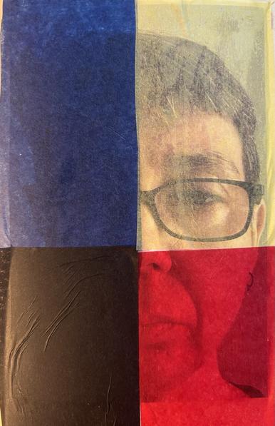 Picture of a white woman’s face. She has short brown hair and rectangular glasses with dark frames. Each quadrant of her face is covered by a piece of tissue paper, yellow, red, blue, and black, some more translucent than others.