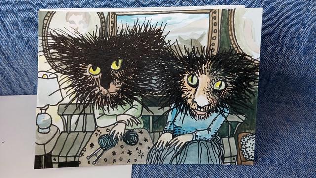 Ink and watercolour drawing. Two people with cat eyes and extremely hairy heads and faces, sitting on a bench. One of them has knitting. There are doilies.