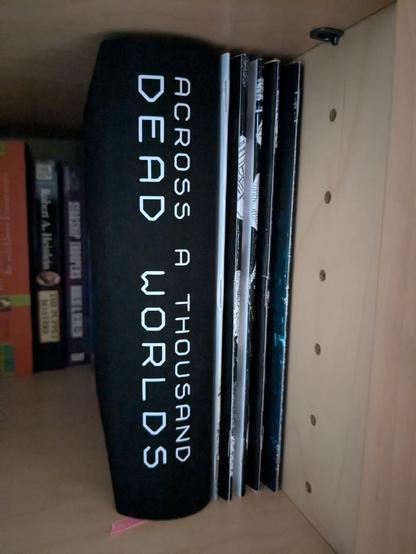 The book sitting on a book shelf and looking great!