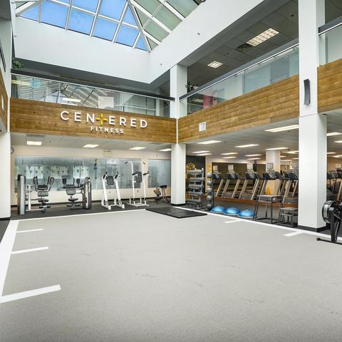 Sign saying “Cen+ered Fitness” (Centered Fitness with a stylized T).