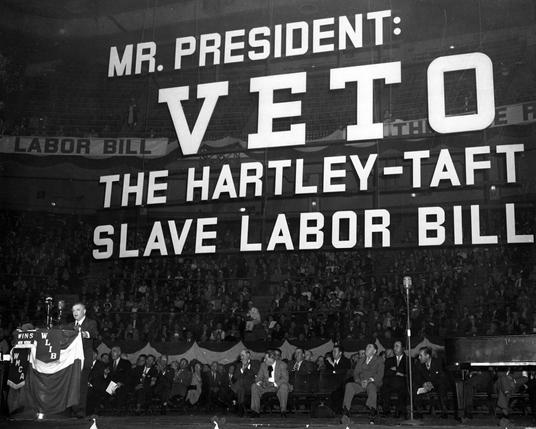 Sign that reads: Mr. President: Veto the Hartley-Taft Slave Labor Bill.