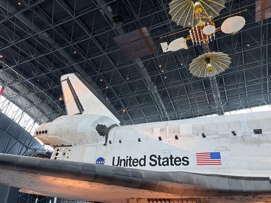 Photo of the fuselage, wing and tail of Space Shuttle Discovery.