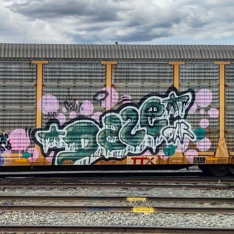 Train car with graffiti rolling through Kamloops BC Canada