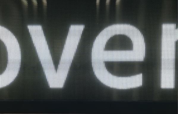 A screen of LEDs displaying letters "v" and "e".