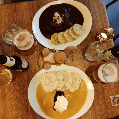 Lunch at Maitrea. Black beer goulash (top) and traditional Svíčková, but vegetarian.. Washed down with hemp beer