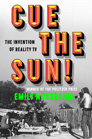 The cover of the book "Cue The Sun! The Invention of Reality TV". It shows the words CUE THE SUN in large orange text, and the rest of the title in smaller black text. The author's name, "Emily Nussbaum", is in green, and above her name is "winner of the Pulitzer Prize". The background is a black and white photo; set in the 70s, it shows two women in bathing suits sitting on backyard deck chairs while a shirtless man in jeans off to the right points a large shoulder-mounted TV camera at them, and a sound engineer holds a recording device off to the left.