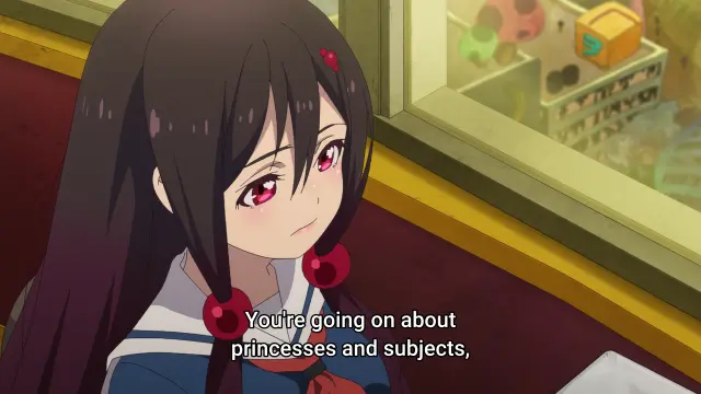A screenshot of Yoka from Train to the End of the World next to a window. The subs read as "You're going on about princesses and subjects".