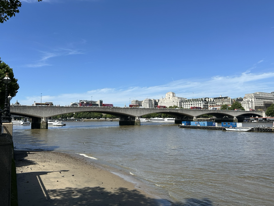 Waterloo bridge in the sunshine with 13 buses visible