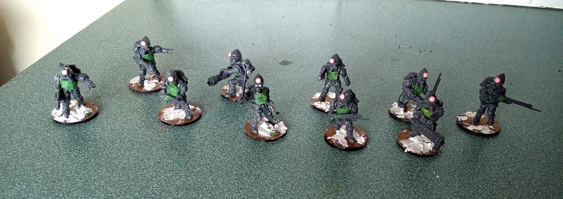 10 infantry models in progress. They have pith helmets, scifi weapons, and green stuff modifications.
