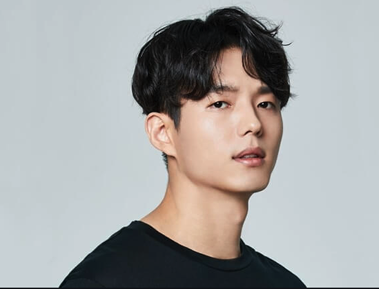 Headshot of South Korean Actor Ha Joon, also known as Song Ha Joon in a black shirt.