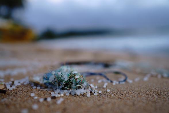 photo - microplastics and plastic pollution on a beach