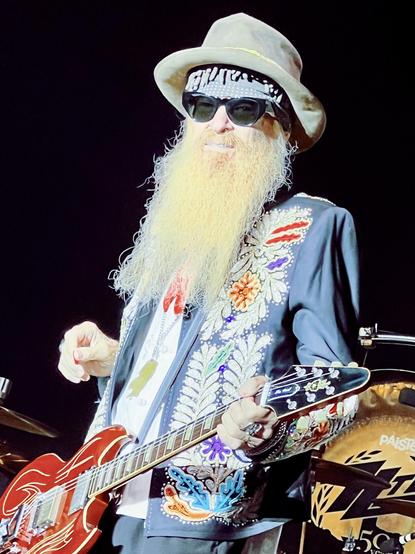 ZZ Top's Billy Gibbons looks at me through his sunglasses at The Elevation Tour 2024 in Germany.