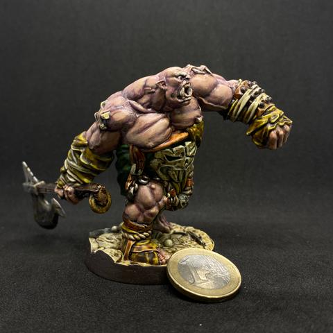 Painted plastic miniature of an ogre swinging a giant axe. There are piercings on its shoulders and torso made from sharpened bones or fangs.