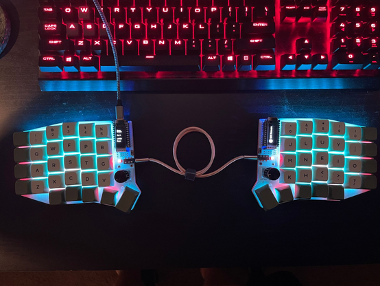 Image of my new hand-built Sofle RGB keyboard.