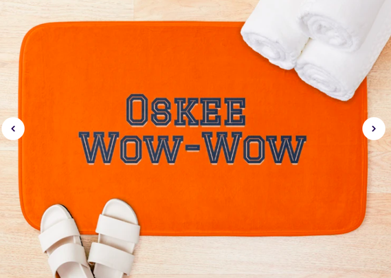 The University of Illinois college fight song Oskee Wow-Wow is shown in Fighting Illini colors on a bath mat.