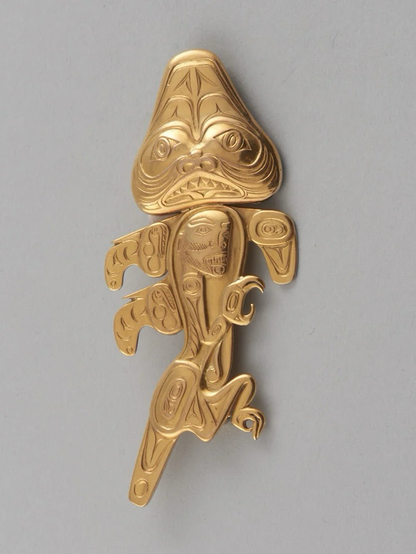 official gallery photo of Reid’s gold Dogfish Woman brooch, top/front profile on grey background