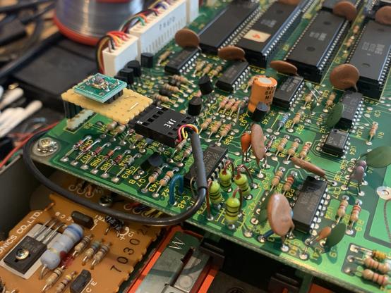 Closeup of the perfboard bodge that reactivates R/W capability on a broken 1541 read head.