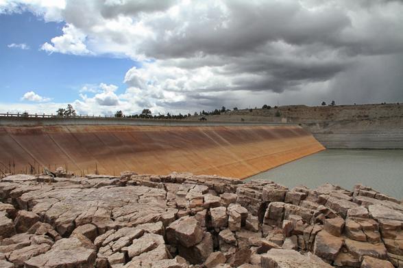 photo - El Vado Dam and bottom of reservoir, drawn down, New Mexico