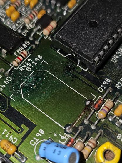 Close up of an Amiga 3000 motherboard showing some slight corrosion where the battery had leaked.