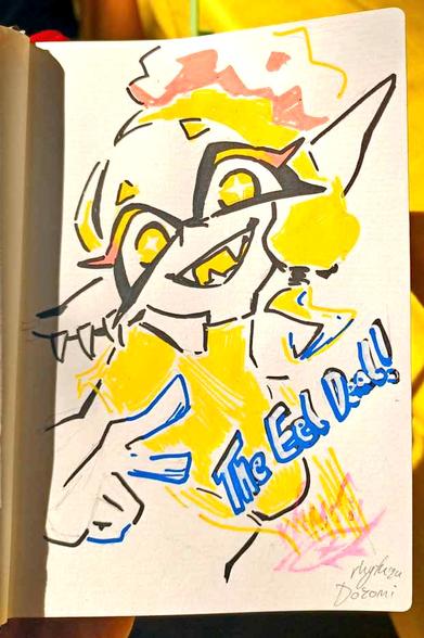 Photo of a Traditional Commission done with Paint Markers. Frye from Splatoon 3 in bright yellow. Text written on the picture reads "The Eel Deal!"