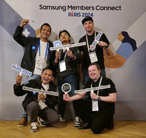 Samsung Members Connect Paris 2024 participants from Lithuania and Indonesia posing at photo wall