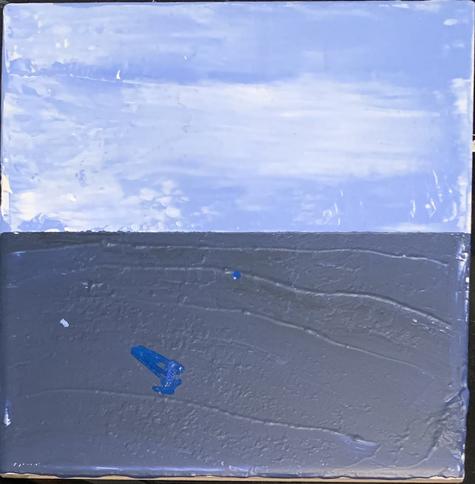 A square divided into two horizontal sections. The top is lighter blue with streaks of white. The bottom is darker blue with black tones and a more ultramarine blue shape in the middle.