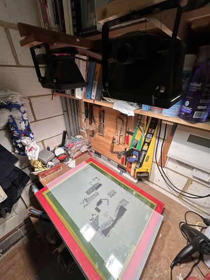 A screen printing screen being exposed.