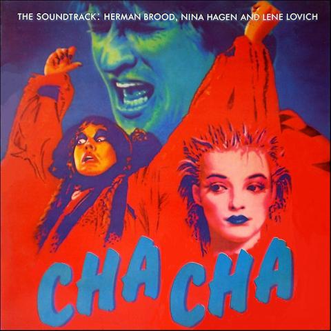 Albumcover van Cha Cha, The Soundtrack.

Een blauwe Herman Brood op een blauwe achtergrond, Lene Lovich op de voorgrond in een knalrood gewaad en met haar armen ik de lucht, het gezicht van een Nina Hagen met blauwe mond fotografisch in de rode jurk gemonteerd.