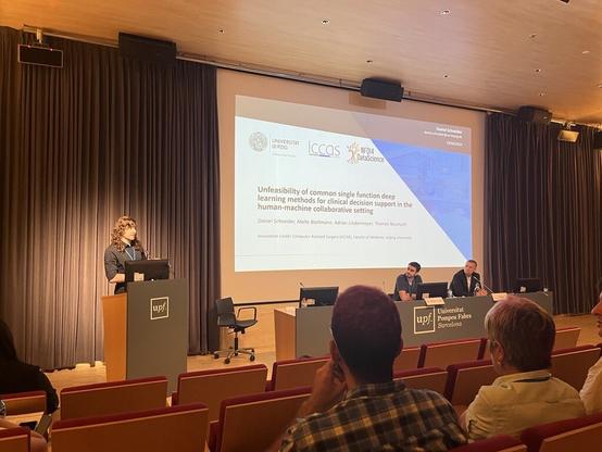 Daniel Schneider at CARS2024 (Computer Assisted Radiology and Surgery) in Barcelona
talking about "Unfeasibility of common single function deep learning methods for clinical decision support in the human-maschine collaborative setting"