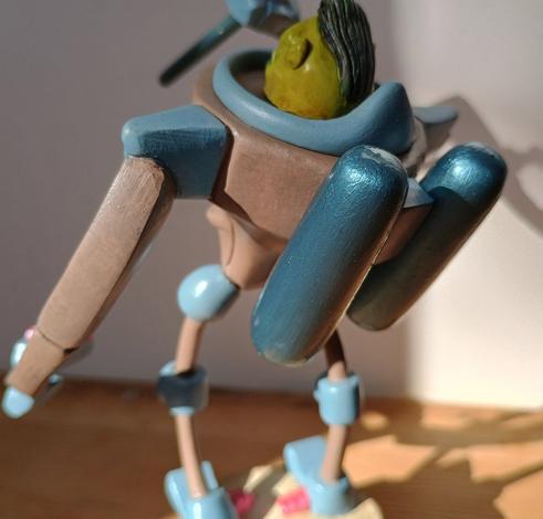 A rear view of the model with it's two shiny metallic gas canisters. You can also see it's thing tube like legs.