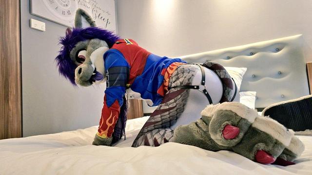 cheeky dragon in flamedramon cosplay from backview