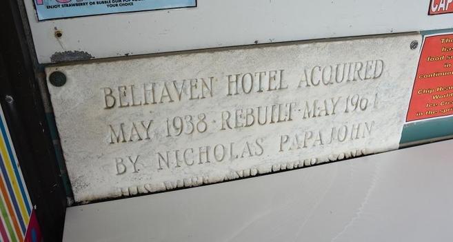 A plaque attached to the wall behind The Ice Cream Store’s toppings table commemorates the Papajohn family’s history with the property.