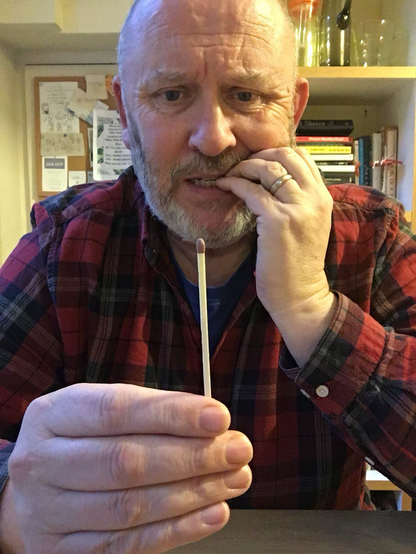 I'm afraid it's a photo of me looking nervous and holding a long match.