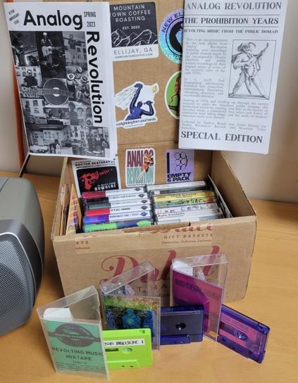 Box of cassettes and zines
