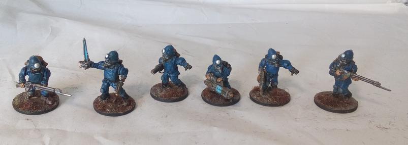 Six scifi soldiers done up like british bobbies.