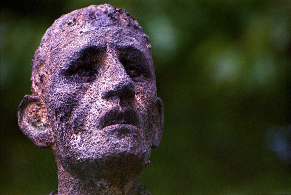 The face of a sculpture, rough cast and weathered by design, in memory of the arrival, in Toronto, of the refugees from the Irish Famine.